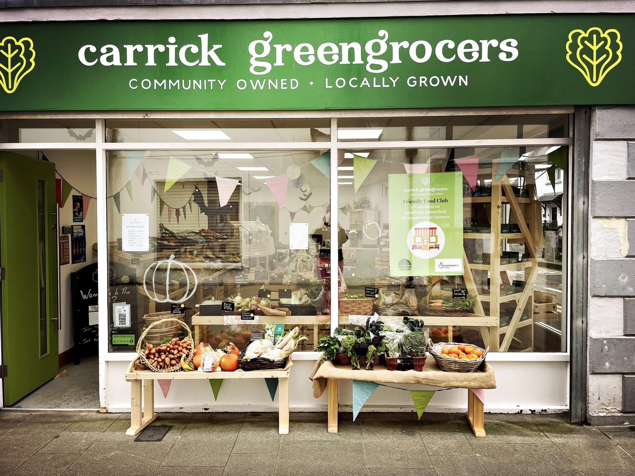 an image showing a greengrocers shop front